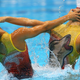 Illustration for article titled Synchronized Swimmers In Wolf Bathing Suits? Synchronized Swimmers In Wolf Bathing Suits